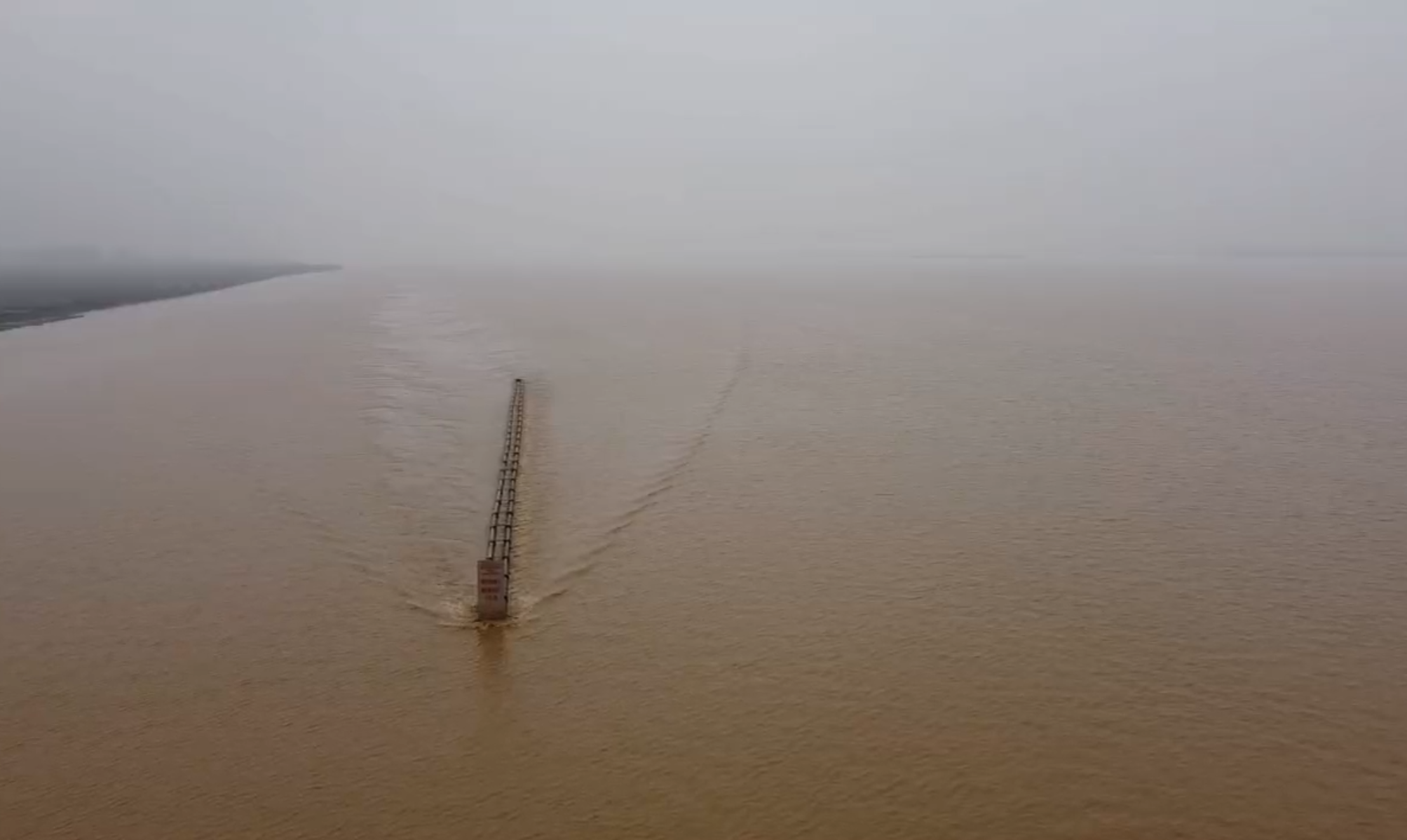 1638806469940040542.png 图5(b)钢管透水桩束流工程.png